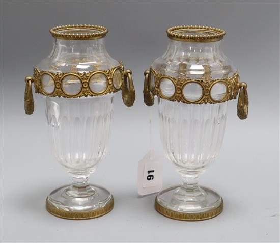 A pair of gilt metal mounted cut glass vases, lacking covers height 21cm